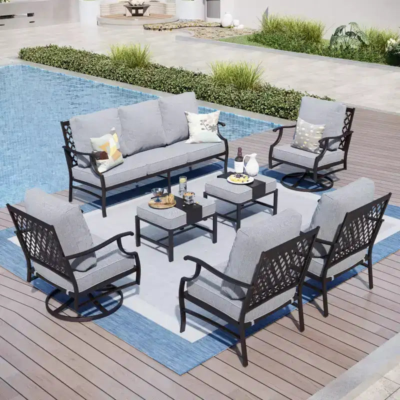 Set da conversazione per esterni Captiva Designs in metallo da 7 pezzi con sedie girevoli dallo schienale a griglia e poggiapiedi per giardino, bordo piscina e cortile