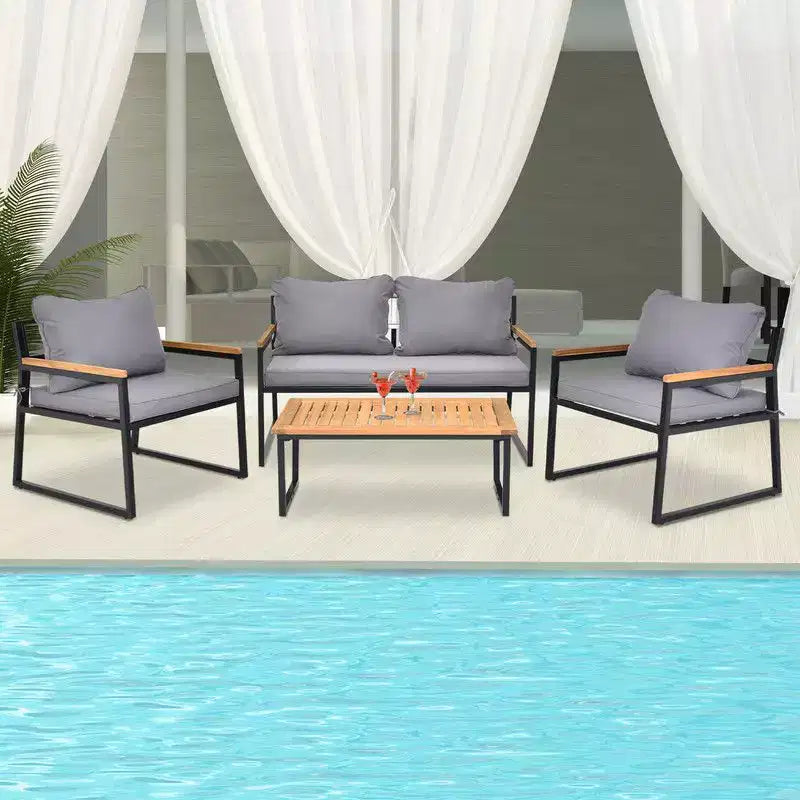 Set da conversazione Karl Home Patio da 4 pezzi in legno di acacia con braccioli e piano del tavolo, completo di cuscini