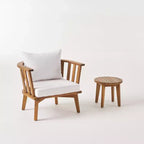 Set composto da poltrona club e tavolino da esterno GDFStudio Lorie in legno di acacia con cuscini, teak/bianco