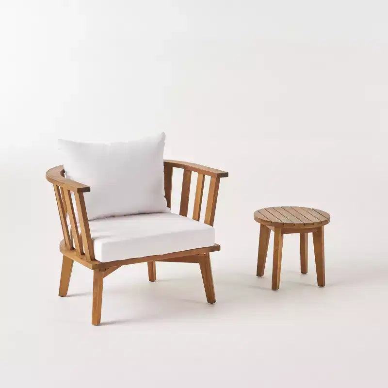 Set composto da poltrona club e tavolino da esterno GDFStudio Lorie in legno di acacia con cuscini, teak/bianco