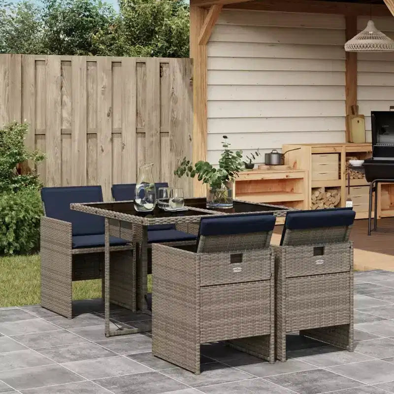 Set da pranzo per patio vidaXL con cuscini, tavolo e sedie da giardino, in polyrattan grigio