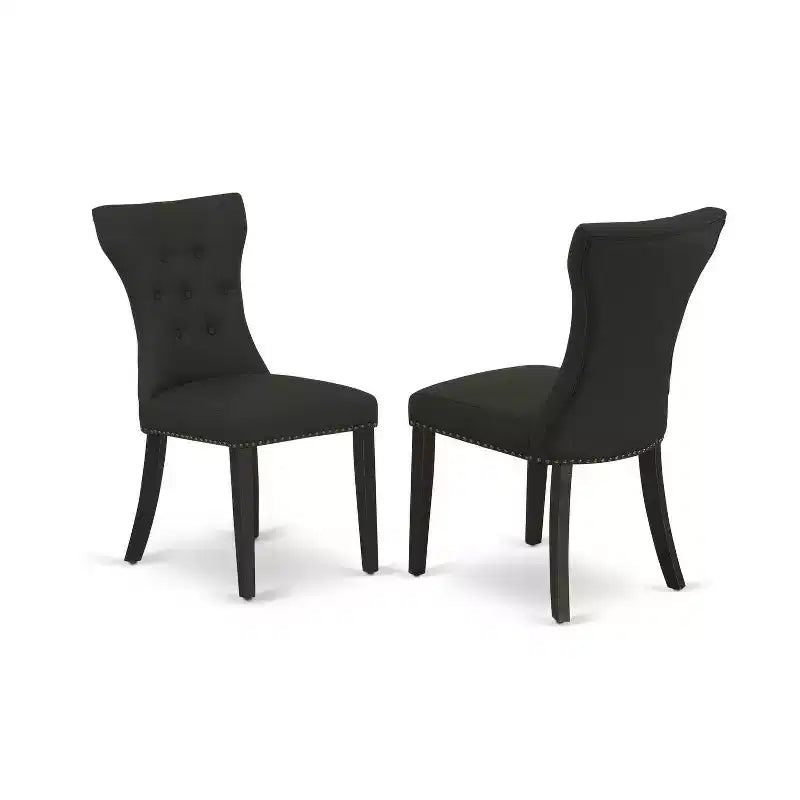 Tavolo da pranzo HomeStock a 5 pezzi con piano rotondo in legno massello con finitura nera e 4 sedie Parson