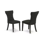 Tavolo da pranzo HomeStock a 5 pezzi con piano rotondo in legno massello con finitura nera e 4 sedie Parson