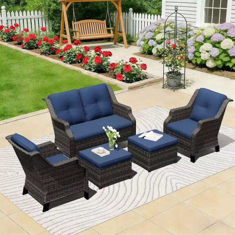 Set da salotto da esterno UPTIOT con divanetto, sedie e pouf