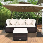 Set di mobili da giardino Costway in rattan composto da 4 pezzi, divano con cuscini e pouf