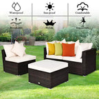Set di mobili da giardino Costway in rattan composto da 4 pezzi, divano con cuscini e pouf