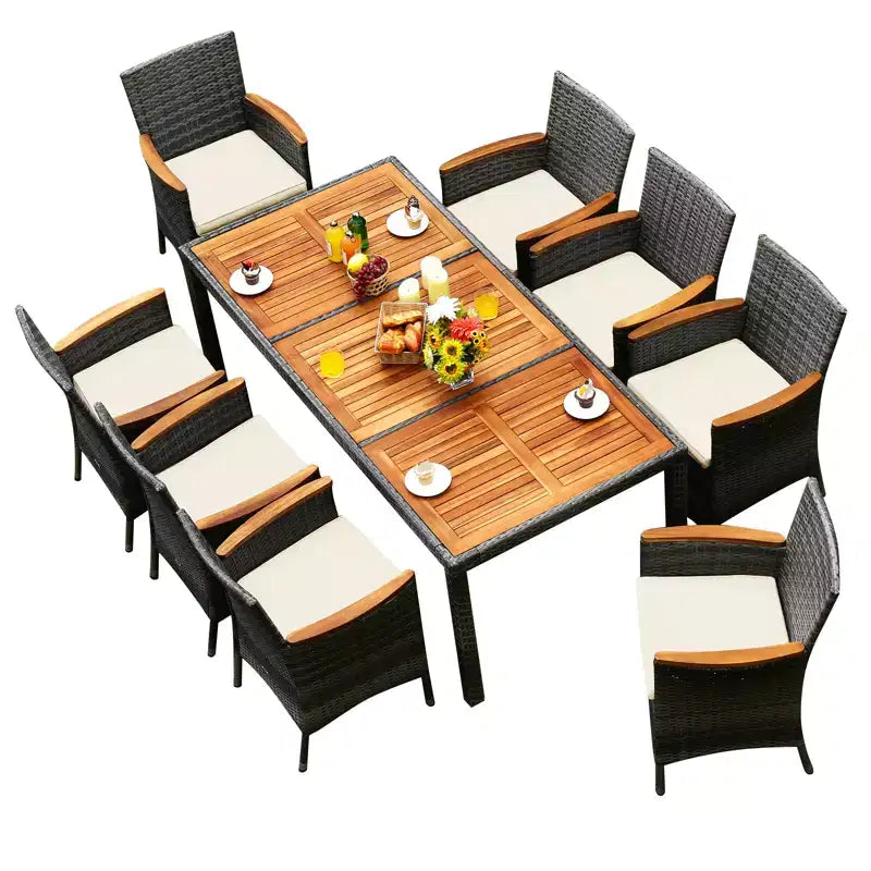 Set da pranzo per patio Costway 9 pezzi in rattan, colore grigio misto, tavolo in legno di acacia e sedie con cuscini