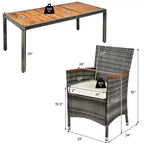 Set da pranzo per patio Costway 9 pezzi in rattan, colore grigio misto, tavolo in legno di acacia e sedie con cuscini