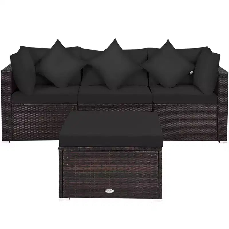 Costway Set Mobili da Giardino in Rattan 4 Pezzi Divano Ottomana Cuscini Esterno Nero