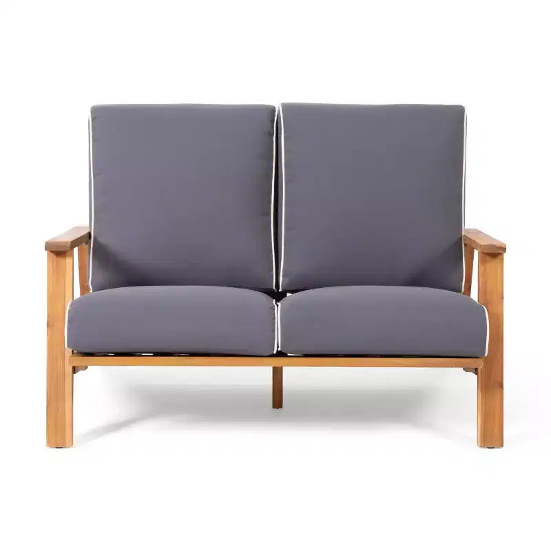 Set divanetto e tavolino da esterno in legno di acacia con cuscini Paloma di Christopher Knight Home