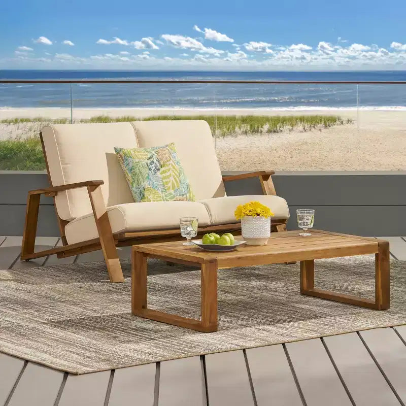Set divanetto e tavolino da esterno in legno di acacia con cuscini Paloma di Christopher Knight Home